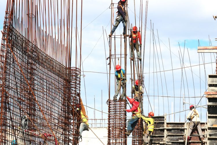 construction workers building a structure